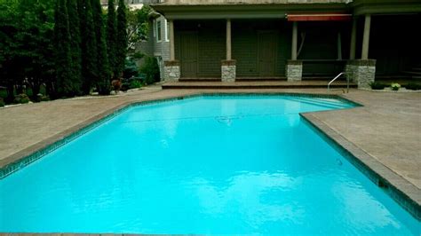 Stamped And Colored Concrete Pool Deck With Custom Cantilevered Concrete Coping By Sierra