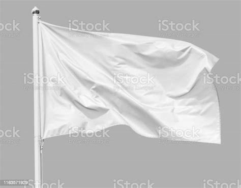 White Flag Waving In The Wind On Flagpole Isolated On Gray Background