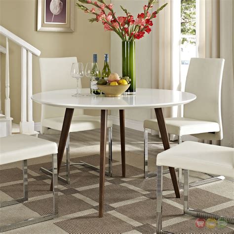 From the more common rectangular tables to elevated tables, your choices are unlimited. Platter Contemporary 47" Round Wood Dining Table, White