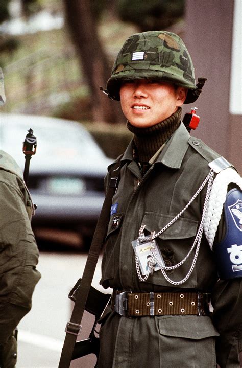 Sgt Park Sung Gyv From The Korean Military Police Stands Guard With