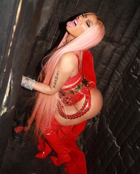 Nicki Minaj Shows Off Her Body In Sexy Red Outfit