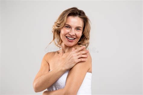 Natural Beauty Portrait Of Attractive Middle Aged Woman Wrapped In