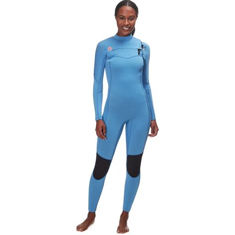 A Woman In A Blue Wetsuit Is Smiling