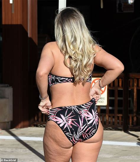 Frankie Essex Flaunts Her Curves In A Skimpy Floral Bikini As She