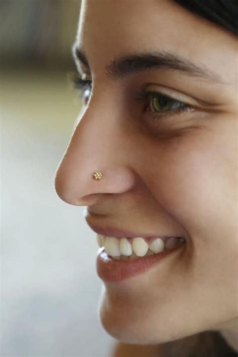 A 14K Yellow Gold Flower Nose Stud This Nose Stud Is Made Of 14K Solid