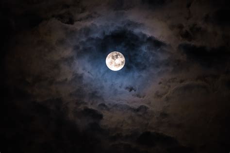 Mysterious Dark Night Sky With Full Moon And Clouds Stock Photo
