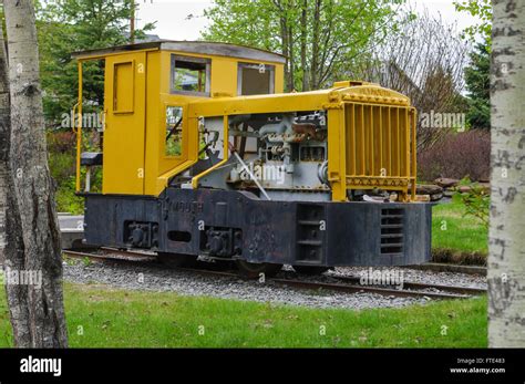 Small Yellow Locomotive Built By Plymouth Locomotive Works Stock Photo