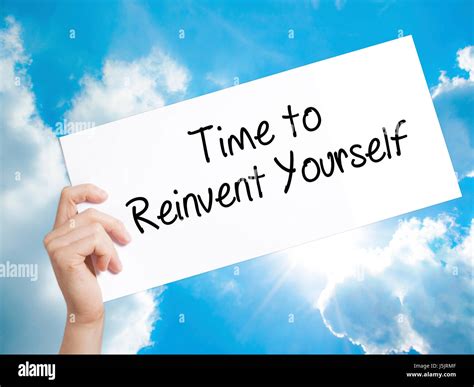 Time To Reinvent Yourself Sign On White Paper Man Hand Holding Paper