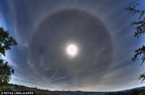 In contrasts to rainbows which you see when you are facing away from the sun, this kind of halo forms as a circle around the sun. Ice rainbow - sun's light through Cirrus clouds | WordlessTech