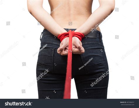 Submissive Topless Asia Woman Wearing Jeans Stock Photo