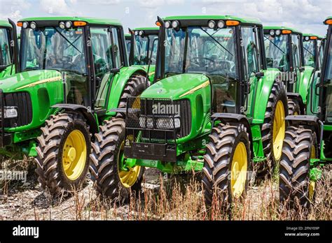 John deere new green tractors display sale farming agriculture hi-res