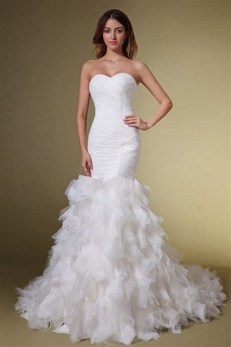 We get it— sometimes shopping for a wedding dress can be the silhouette of choice for brides with a royal sense of style, ball gowns are striking and dramatic. DressyBridal: Mermaid Wedding Dresses with Layered Skirt