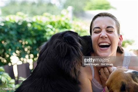 Dog Licking Woman Face Stock Fotos Und Bilder Getty Images