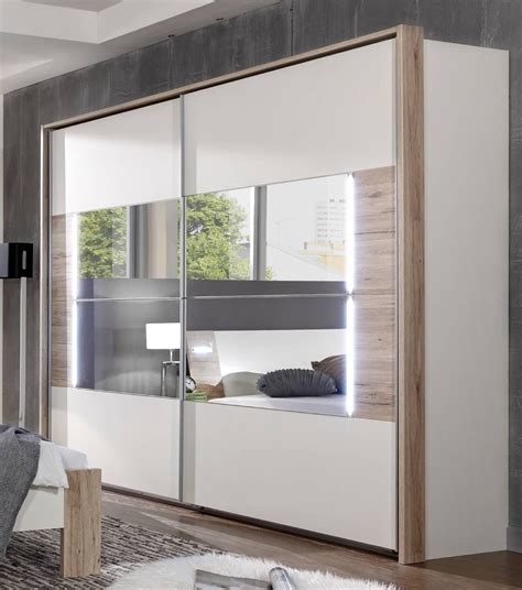 Quality sliding wardrobe doors made in the uk by the leading sliding wardrobe manufacturer. German Downtown White & Oak 270cm Sliding Door Mirrored ...