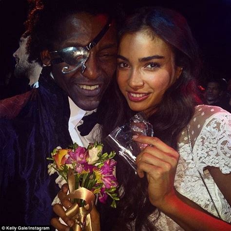 Kelly Gale Poses With Trainer To The Stars Michael Olajide Jr At
