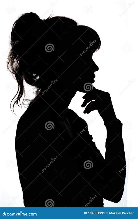 Silhouette Of A Thoughtful Woman With Hand Near Her Chin Thinking About