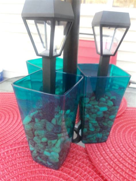 Make sure the vases are clean and use the sharpie markers to draw the dandelions. Dollar Store DIY- Led Solar Lights, Stones, and Plastic ...