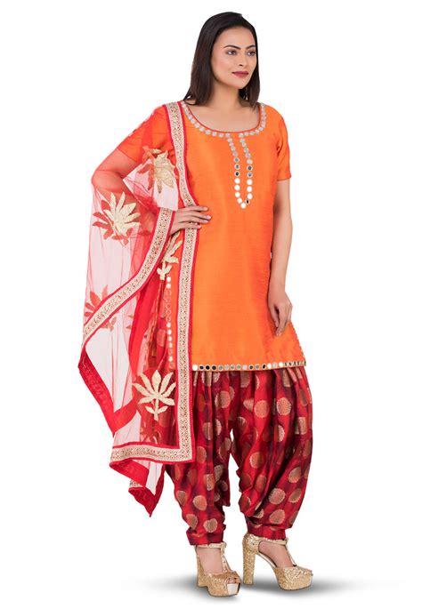 Embroidered Neckline Dupion Silk Punjabi Suit In Orange Kjn3202