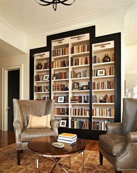 White Wood Living Room Featured With Floor To Ceiling White Bookcase
