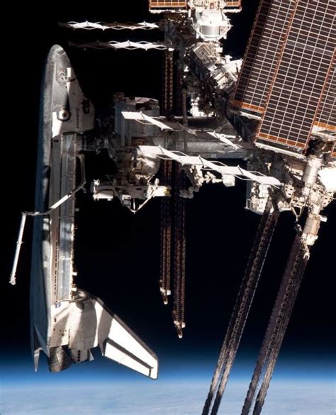 The International Space Station And The Docked Space Shuttle Endeavour