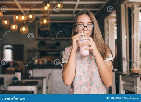 Teen Girl Drinking Smoothie In Cafe Stock Image Image Of Teen Glasses 160357553