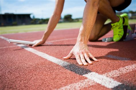 From wikimedia commons, the free media repository. Athlete Ready To Start The Relay Race Stock Image - Image ...