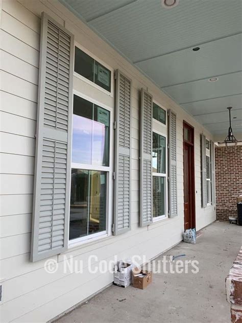 Aluminum Louvered Colonial Shutters With Horizontal Mullions And Faux