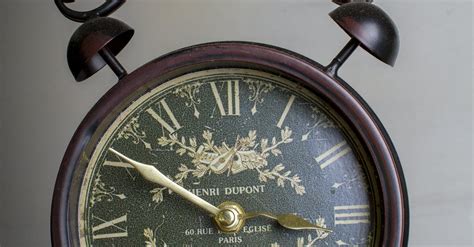 Brown Framed Alarm Clock On Brown Table · Free Stock Photo