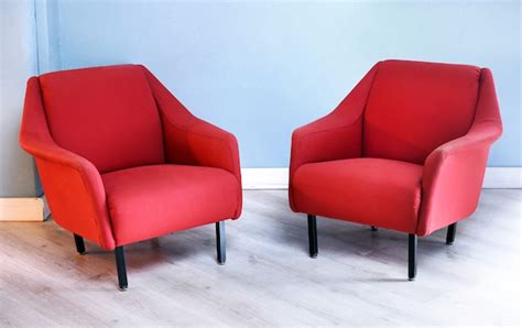 Premium Photo Pair Of Red Retro Arm Chairs In Living Room