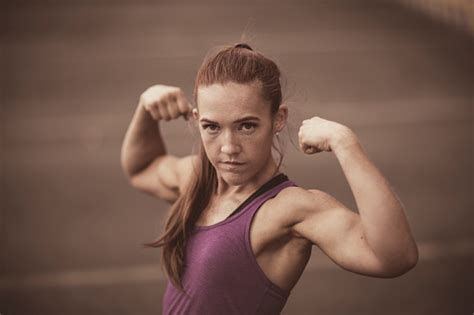 Physically Fit Woman Flexing Stock Photo Download Image Now 30 39