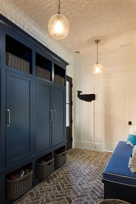 Navy Blue Mudroom Locker Cabinets With Brick Herringbone Floor