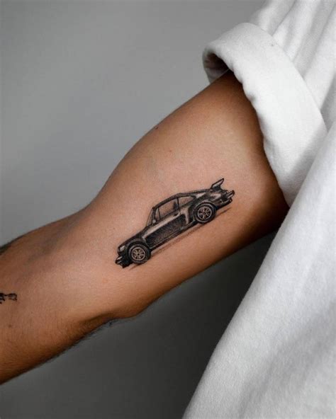 Micro Realistic Porsche Tattoo On The Inner Arm