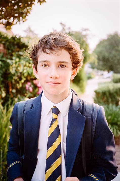 Teenage Boy In A School Uniform With Backpack By Stocksy Contributor