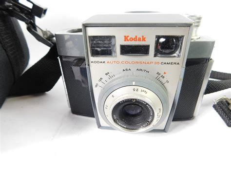 A Pentax Mv Camera With A Smc Pentax M 12 50mm Lens 5157291 A Tokina