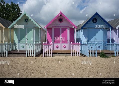 Colourful Beach Huts On The Beach Mersea Island Essex Stock Photo Alamy