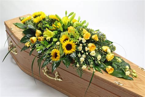 Yellow Coffin Spray Neville Funerals