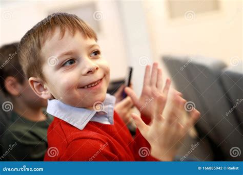 Child Applauds In Theater Stock Photo Image Of Happiness 166885942