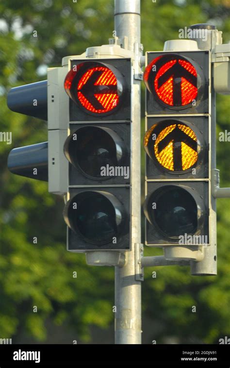 Two Red Traffic Lights For Left Turning Drivers And Straight On