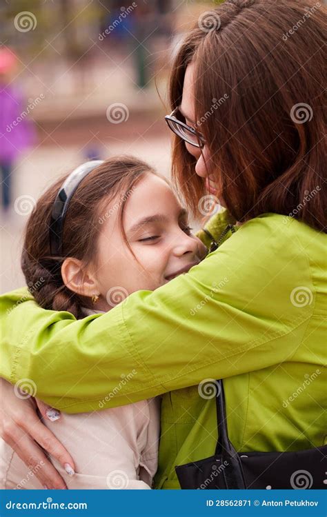 Mom Hugs Her Daughter Stock Image Image Of Embrace Emotions 28562871
