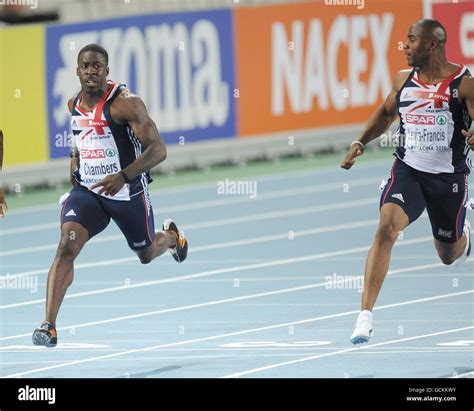 Great Britains Mark Lewis Francis Right Looks Across At Dwain Chambers As They Finish Behind