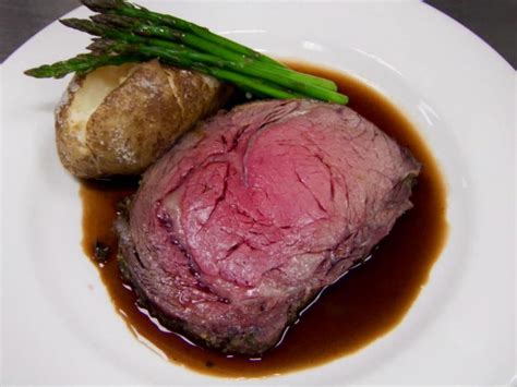 The ribs are sliced from the prime rib before serving and saved just for this recipe. Herb Crusted Prime Rib Roast Recipe | Robert Irvine | Food ...
