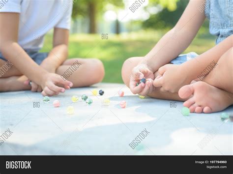 Kids Playing Marbles Image And Photo Free Trial Bigstock