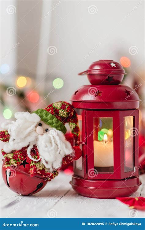 Red Christmas Lantern On White Background With Fir Branches And Lights