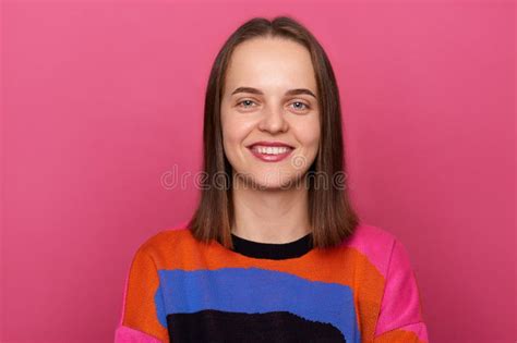 Image Of Joyful Woman Wearing Sweater Posing Against Pink Wall Looking