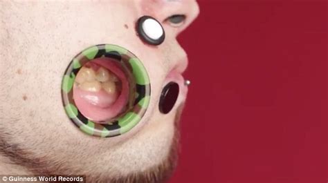 the man who can suck lollipops through his cheeks… but soup leaks out extreme body artist who