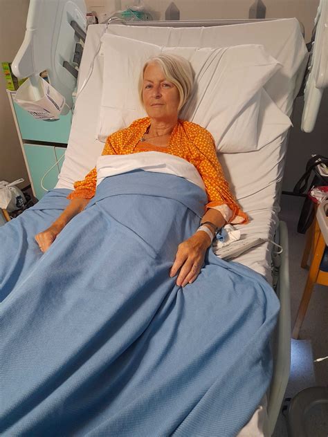 Woman Sick In Hospital Bed