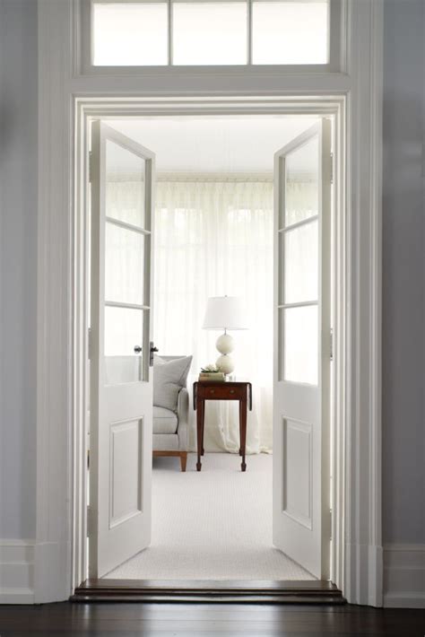 Designer wood interior doors with glass panel inserts. Colonial Revival Restored • Projects • 3north - pretty French interior doors with #transom #fren ...
