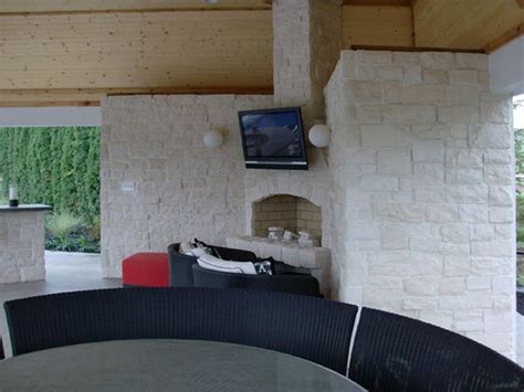 48 Stone Age Fireplace Kit Incorporated Into A Wall With Tv