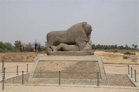 Lion Of Babylon In Iraq 2600 Years Ago With Blue Sky Stock Photo