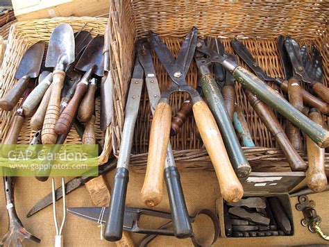 The right gardening tools can make caring for your landscape a lot easier. Old garden tools for... stock photo by Graham Strong ...